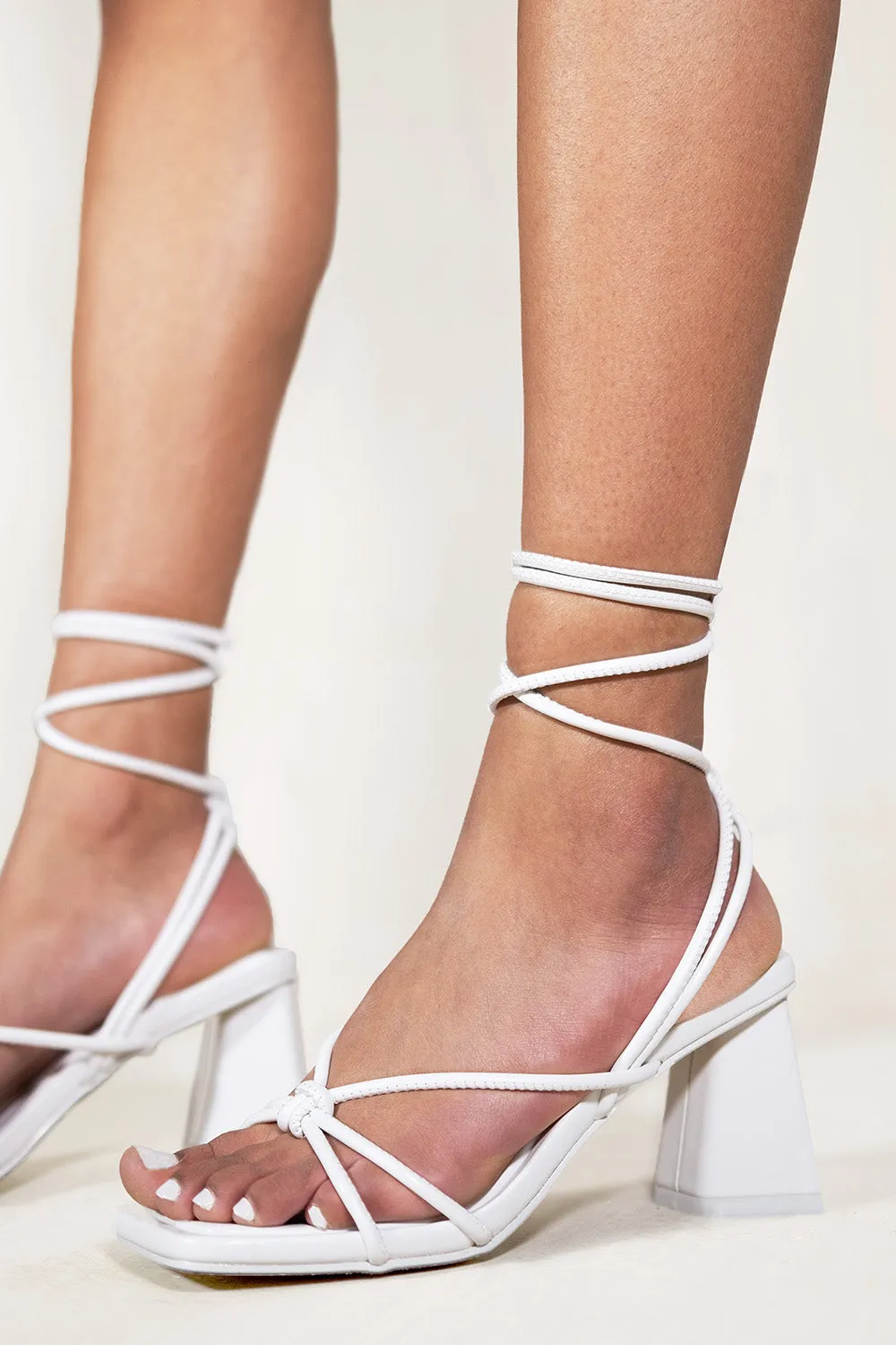 GIAVANNA STRAPPY SQUARE TOE BLOCK HEELS IN WHITE FAUX LEATHER
